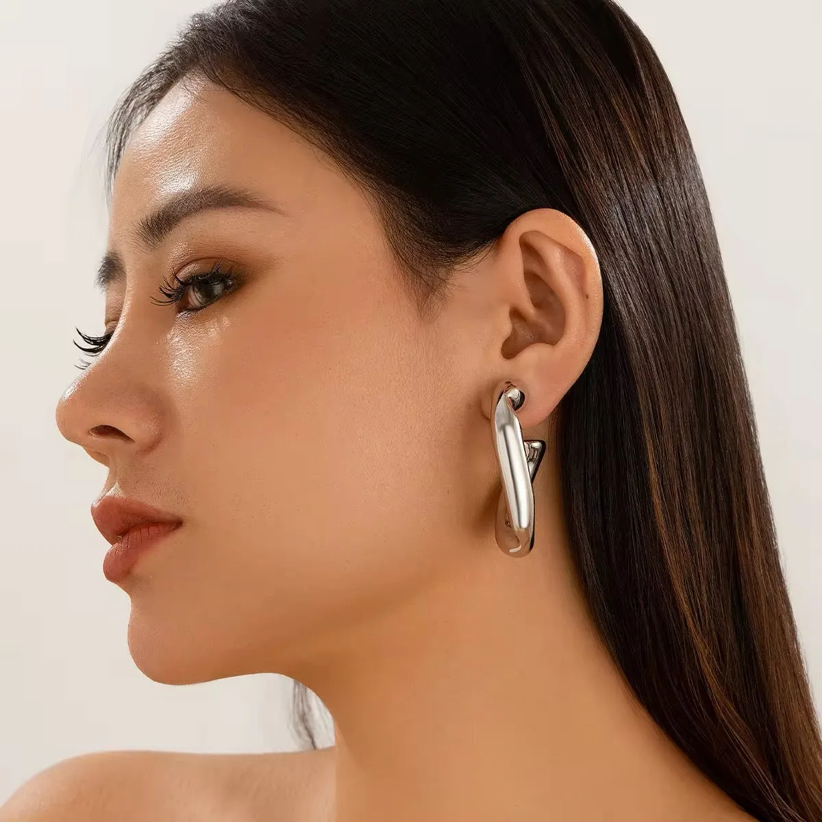 Geometric Irregular C-Shaped CCB Piercing Stud Earrings